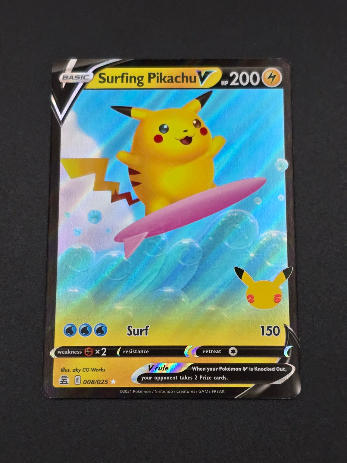 Surfing Pikachu V #008/025 Celebrations 25th — FRONT