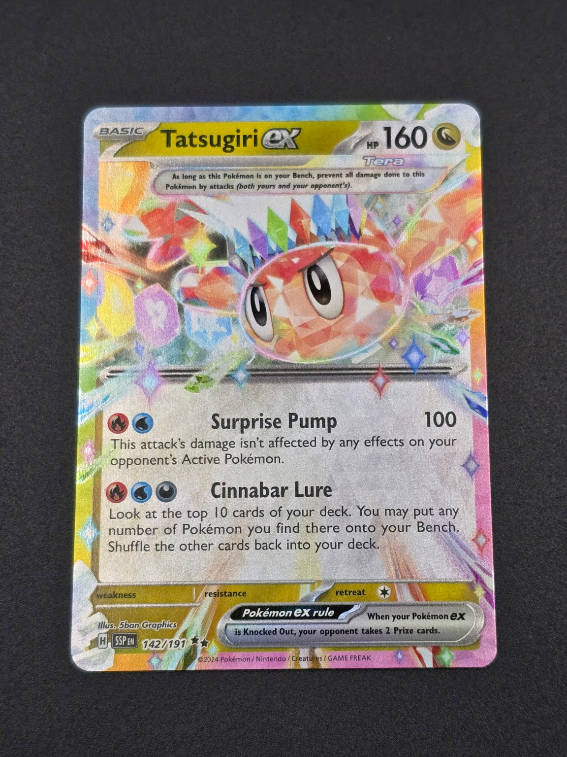 Tatsugiri ex #142/191 Surging Sparks — FRONT